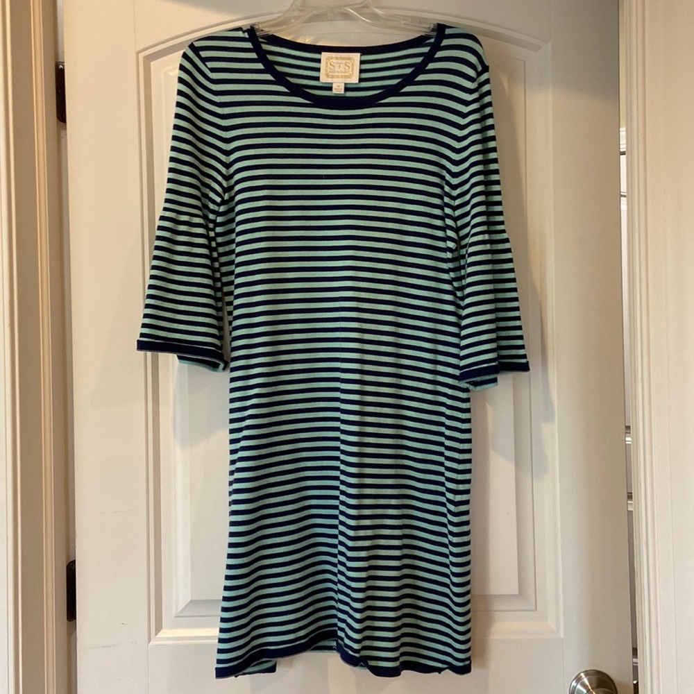 Sail to Sable medium dress with bell sleeves.